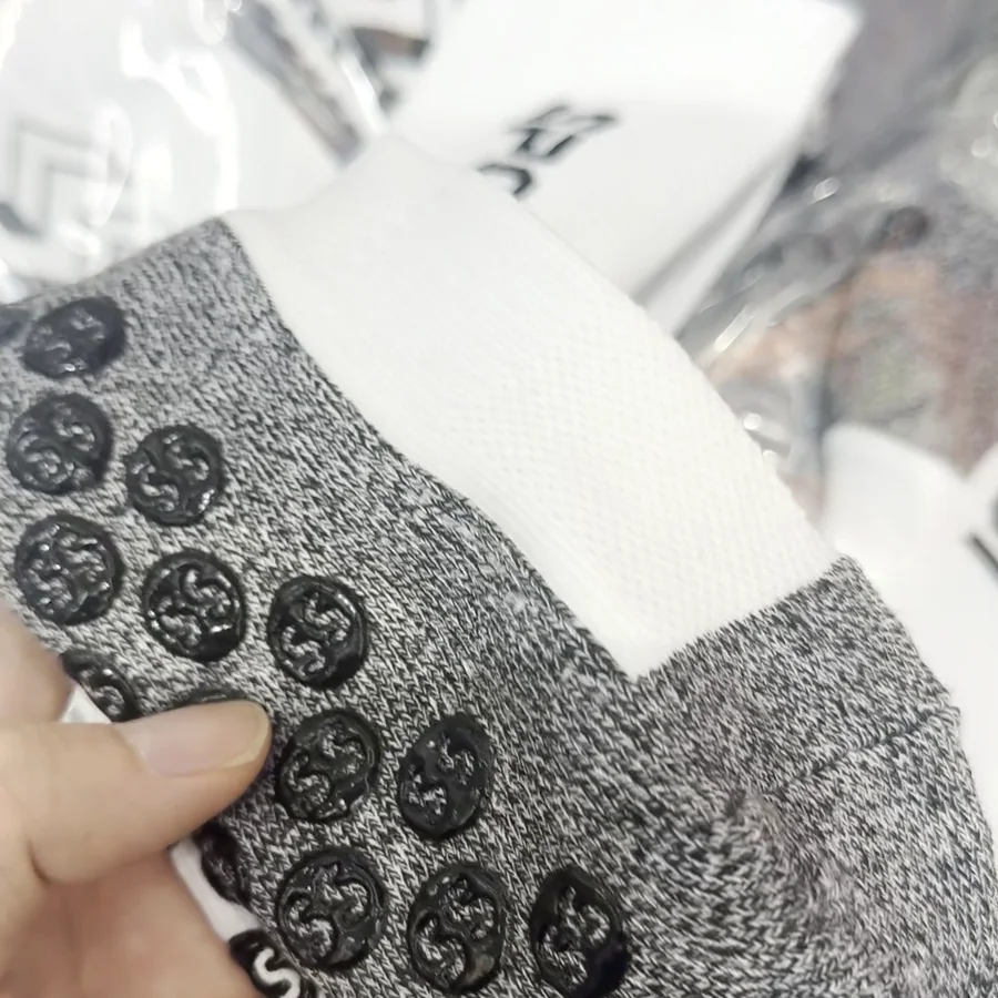 Close-up of the non-slip sole with silicone dots (real photo)