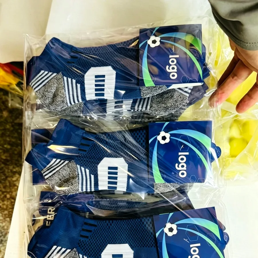Socks packed in individual bags with branded hangtags